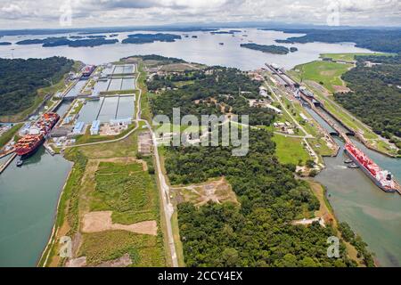 Aerial view of two Neo-Panamax container ships crossing the third set of locks at the pacific side, Panama Canal, Panama Stock Photo