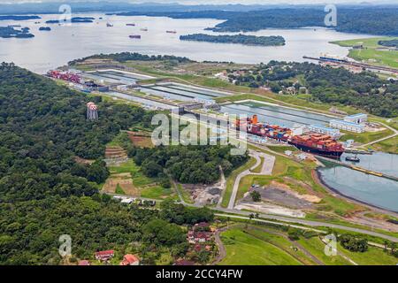 Aerial view of two Neo-Panamax container ships crossing the third set of locks at the pacific side, Panama Canal, Panama Stock Photo