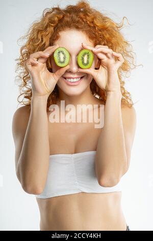 Female in a strapless bra enjoying her cosmetic procedure Stock Photo