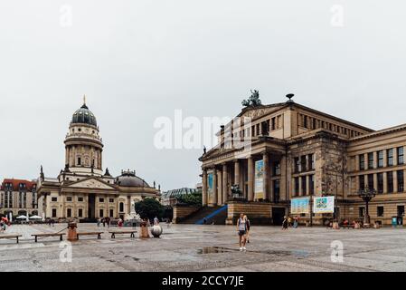Berlin, Germany - July 29, 2019: View of Gendarmenmarkt square in Berlin Mitte a rainy day of summer. Stock Photo