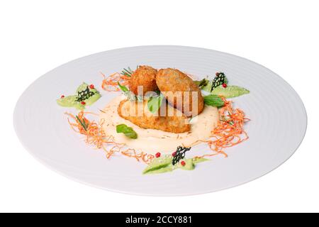 Dish with cutlets on a white background. Stock Photo