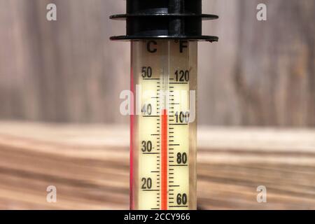 Closeup of a thermometer displaying high 40-degree hot temperature Stock Photo