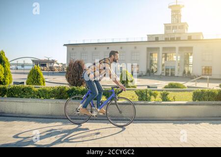 Man in profile bicycle riding a city Stock Photo