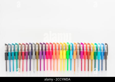 school supplies to paint with ordered colored markers for children on a white background Stock Photo