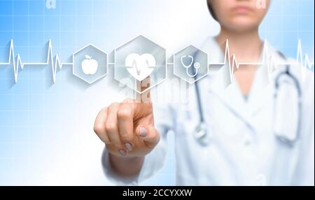 Medical innovations. Female doctor's hand touching heart pictogram on virtual screen, collage with copy space Stock Photo