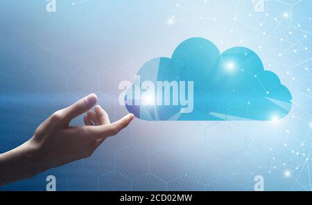 Data Storage. Male Hand Touching Abstract Cloud Icon With Polygonal Wireframe Connections Stock Photo