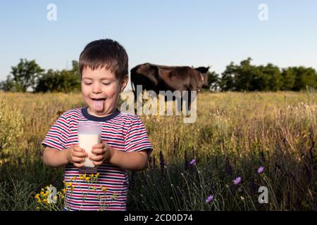 A small child boy in a striped bright T 
