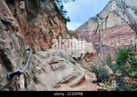 Hiking along a Ridge overlooking a Canyon. Stock Photo