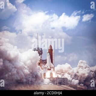 Space shuttle launches from spaceport. Elements of this image furnished by NASA