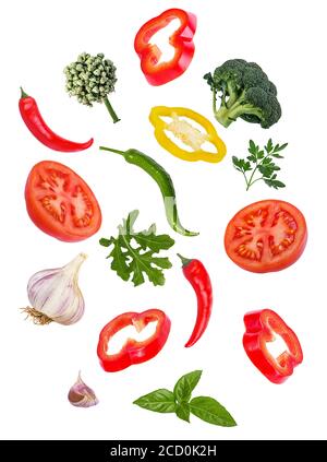 pepper, garlic, parsley, arugula, tomato, broccoli, basil, hot pepper, onion isolated on white background Stock Photo