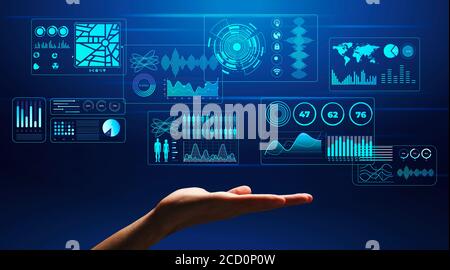 Hand holding business software image over blue Stock Photo