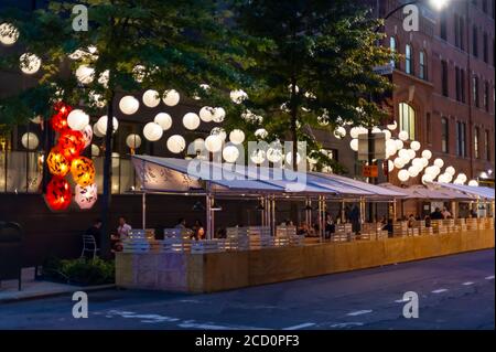 Al fresco dining at a Buddakan restaurant in the Chelsea neighborhood of New York on Thursday August 20 2020. While al fresco dining is now allowed indoor dining as part of the