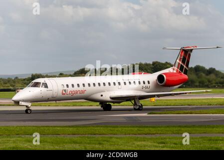 MANCHESTER UK, AUGUST 20 2020: Loganair airlines Embraer ERJ-145EP flight LM525 from the Isle of Man, UK, is documented taxying on the airport taxiway Stock Photo