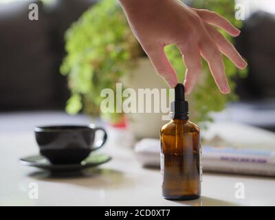 Taking generic medicine at home Stock Photo