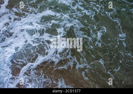Water movement near the coast. View from above. Texture for background Stock Photo