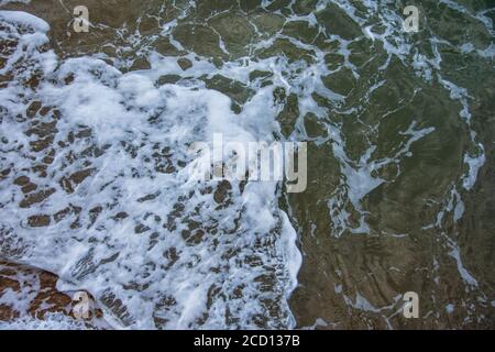 Water movement near the coast. View from above. Texture for background Stock Photo