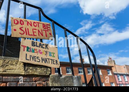 Woodbridge, Suffolk, UK June 19 2020: Homemade BLM protest signs that have been fixed to the town hall in the center of Woodbridge to show the town an Stock Photo