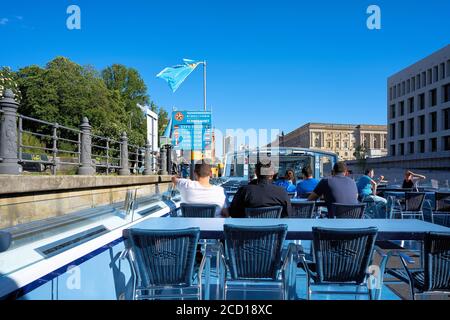 Excursion boat with tourists on the river Spree in Berlin Stock Photo
