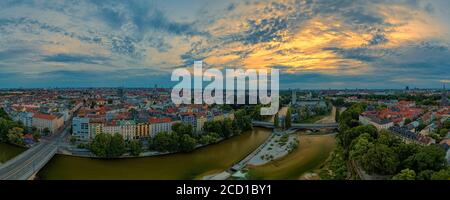 Munich city center with the Frauenkirche and the Isar river from above at an aerly sunrise the 23th of may 2020, bavaria, germany Stock Photo