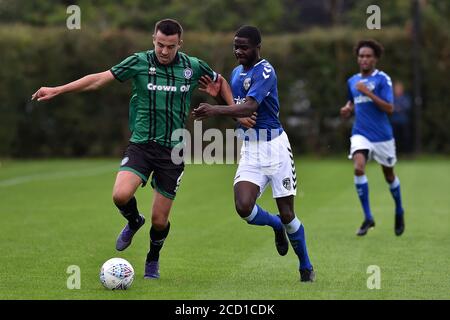 OLDHAM, UK. 25th Aug, 2020. Oldham Athletic's Junior Luambo and Rochdale's Eoghan O'Connell during the Pre-season Friendly match between Oldham Athletic and Rochdale at Chapel Road, Oldham (Credit: Eddie Garvey | MI News) Credit: MI News & Sport /Alamy Live News Stock Photo