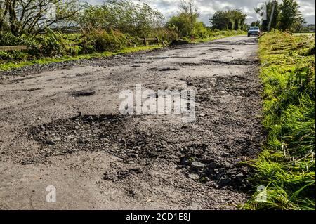 Clonely, West Cork, Ireland. 25th Aug, 2020. The Caheragh to Drimoleague road at Clonely was destroyed during major floods during Storm Francis last night. Cars negotiated the broken road at a crawl this evening. Cork County Council was on scene assessing the damage. Credit: AG News/Alamy Live News Stock Photo