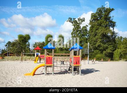 Empty outdoor playground on a beach on a sunny day. Stock Photo