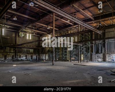 Interior of old abandoned factory warehouse. Stock Photo