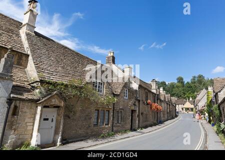 Old stone cottages and picturesque village street, “Castle Combe”, Wiltshire, Cotswolds, England, UK Stock Photo