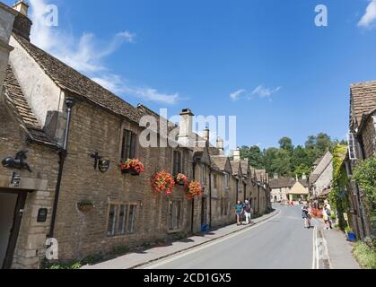 Old stone buildings and village street, “Castle Combe”, Wiltshire, Cotswolds, England, UK Stock Photo