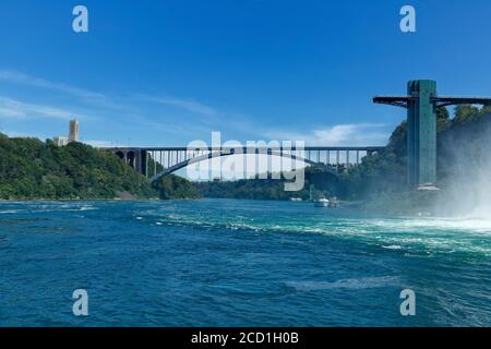 Rainbow International Bridge and Rainbow International Bridge Observation Tower seen from Niagara river. Niagara Falls Stock Photo