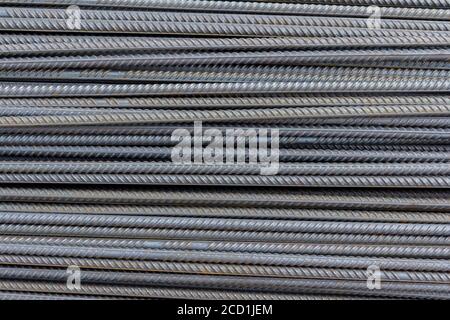 Brand new armature. Reinforcements steel bars stack. Close up steel construction armature. Construction rebar steel work reinforcement in conncrete st Stock Photo