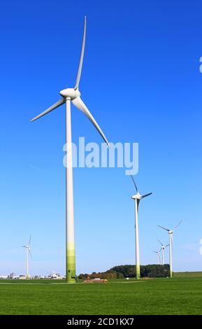 Wind turbines under a blue sky Stock Photo - Alamy