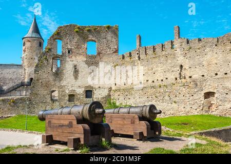 Cannons next to the 13th century Episcopal Castle ruin in Haapsalu. Estonia, Baltic states, Europe Stock Photo