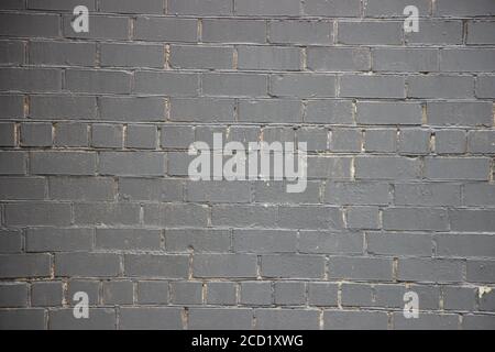 Black painted grunge brick wall background texture Stock Photo