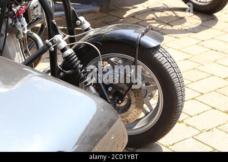 Closeup shot of the details of a motorcycle with a stroller Stock Photo