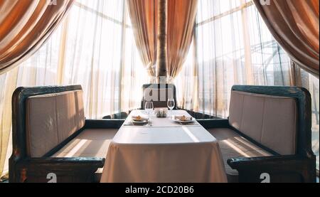 Served table for two persons in the restaurant. Stock Photo