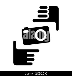 Two hands form a picture frame with camera icon. Photo sign black symbol on white background. Stock Vector