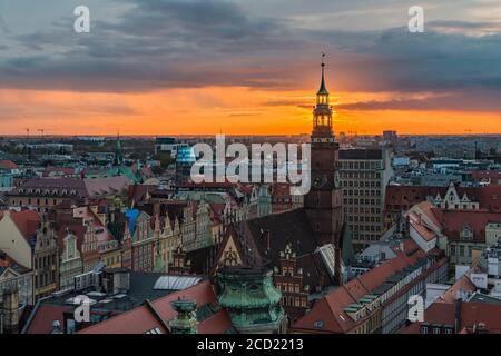 A panoramic view of Wroclaw's Town Hall Tower and Market Square at sunset. Stock Photo