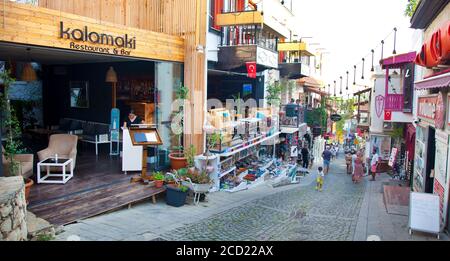 Restaurants, bars and tourist shops in Kalkan, Turkey. Kalkan is a popular holiday destination and is located on the Turkish Mediterranean coast.  - A Stock Photo