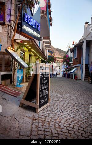 Restaurant sign and jewellery store in Kalkan, Turkey. Kalkan is a popular holiday destination and is located on the Turkish Mediterranean coast.  - A Stock Photo