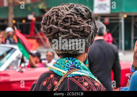 Woman with dreadlocks at New York City Puerto Rican Day parade Stock Photo