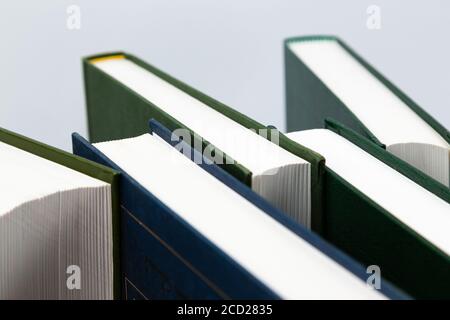 Stacked Books side view Isolated On White Background Stock Photo