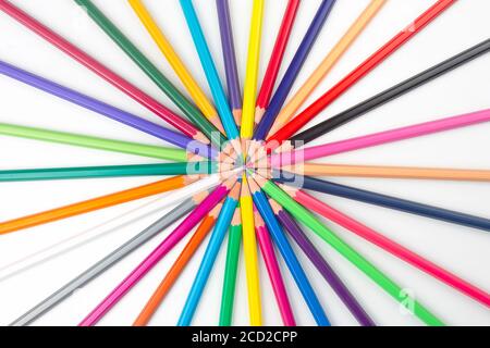 Colored pencils for drawing on a white background. Education and creativity. Leisure and art Stock Photo