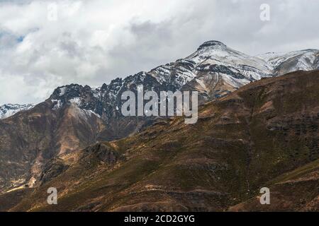 Dramatic Andes mountain range in the snow, Colca Canyon, Arequipa region, Peru Stock Photo
