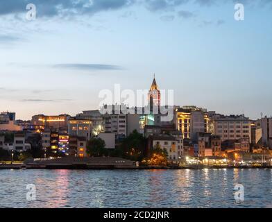 ISTANBUL, TURKEY - MAY, 23, 2019: an evening shot of galata tower from galata bridge in istanbul Stock Photo