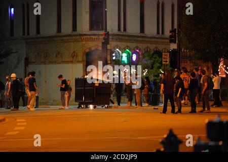 Rioters in the streets of wisconsin state capitol madison light fires in garbage bins to protest the death of jacob black of kenosha. Stock Photo