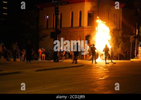 Rioters in the streets of wisconsin state capitol madison light fires in garbage bins to protest the death of jacob black of kenosha. Stock Photo