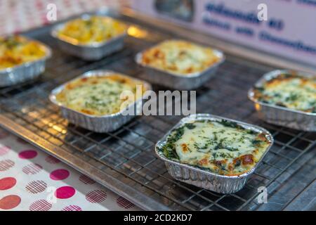 close up of Baked lasagna in a metal dish in street market Stock Photo