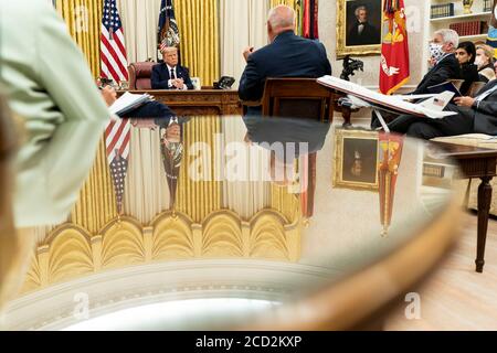 President Donald J. Trump, joined by Vice President Mike Pence and members of the White House Coronavirus Task Force, participates in a coronavirus update briefing Monday, Aug. 4, 2020, in the Oval Office Room of the White House. Stock Photo