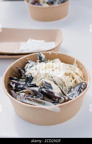 a dish with mussels in shells pasta Stock Photo